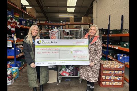 (L-R): Donna Beevers, head of people at First4Lawyers, and Charlie Taylor, The Welcome Centre’s fundraising manager, with the obligatory big cheque